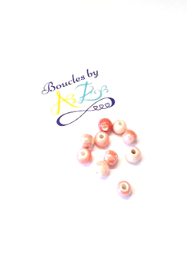 Perles rondes roses en céramique 6mm x10.