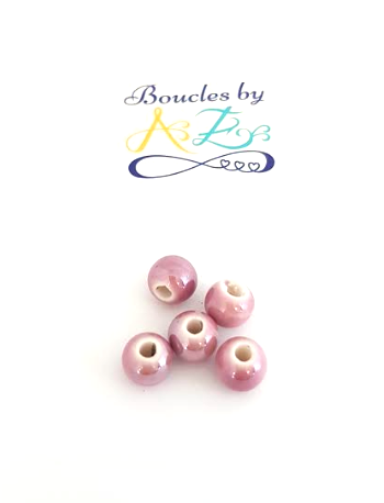 Perles mauves en céramique 8mm x5.