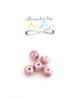 Perles mauves en céramique 8mm x5.