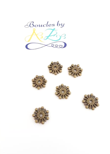 Perles intercalaires flocons bronze 9mm x10.