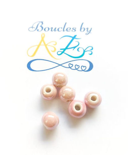Perles roses en céramique 8mm x5.