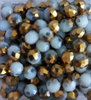 Perles bicolores gris/doré 4x3mm x50