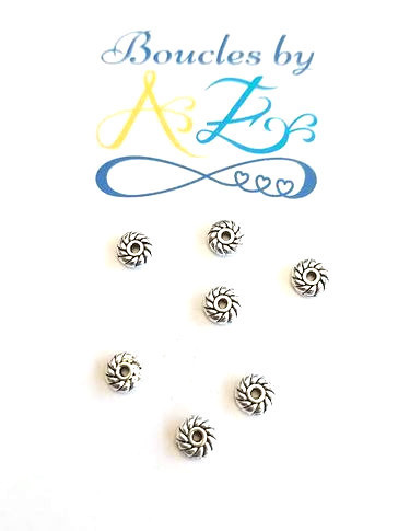 Perles intercalaires fleurs argentées 6mm x30.
