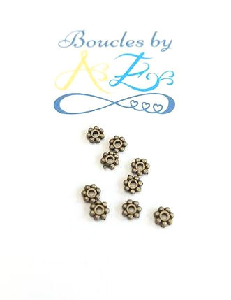 Perles intercalaires fleurs bronze 4mm x50.