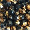 Perles bicolores noir/doré 6x5mm x40