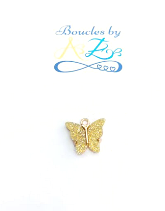 Breloque papillon jaune 14x16mm.