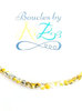 Perles tricolores jaune/noir/blanc 4mm x50